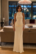 Front view of Champagne high-neck maxi dress with waist draping