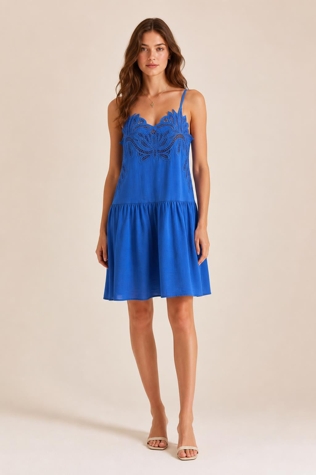 Front view of model wearing Royal Blue embroidered cami mini dress