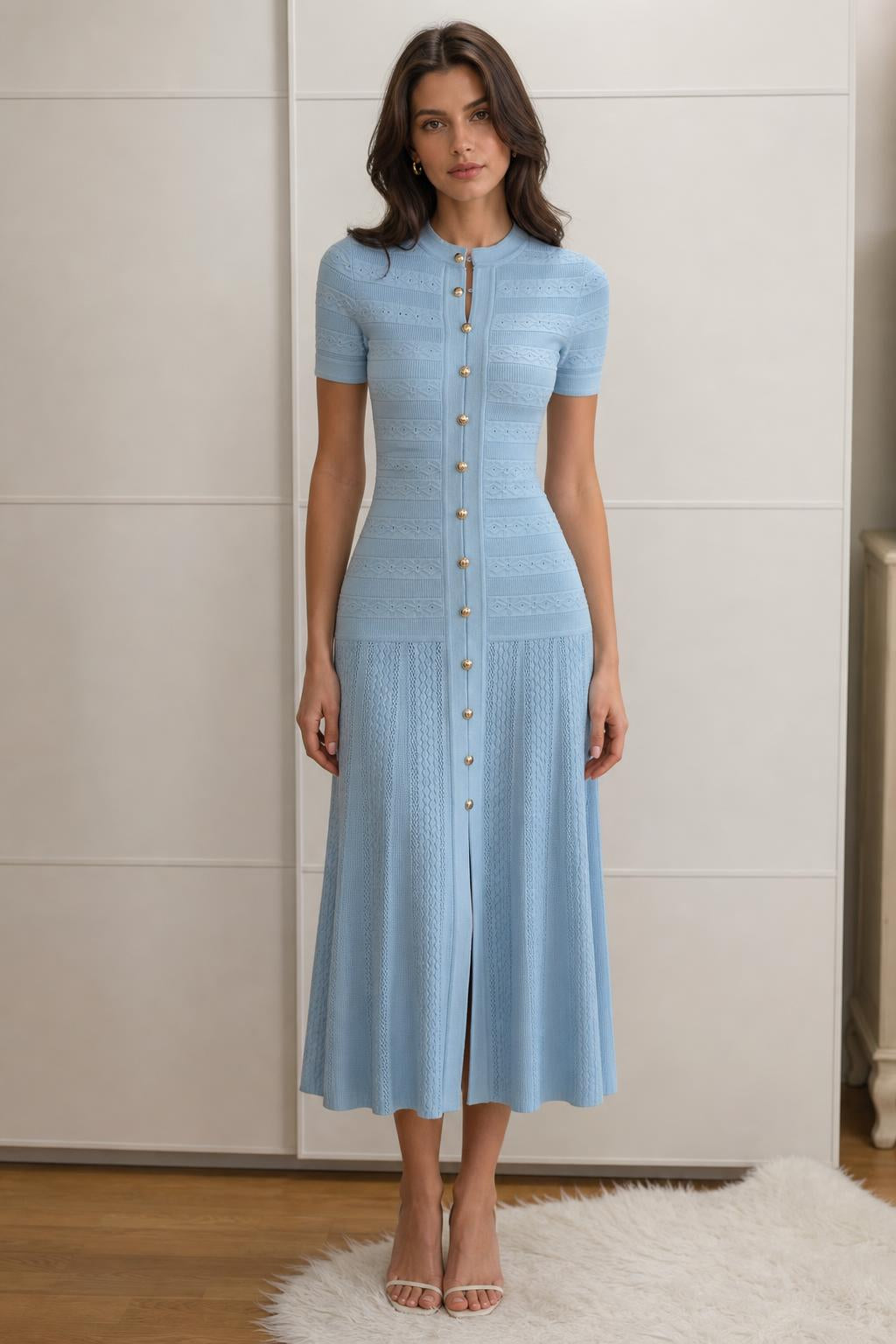 Front view of light blue knit midi dress on model