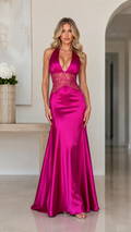 Front view of fuchsia satin-look halter mermaid maxi evening dress with lace waist panel