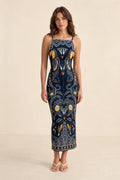 Full length front view of model wearing Navy printed midi dress