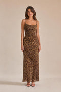 Front view of woman wearing brown leopard print maxi slip dress