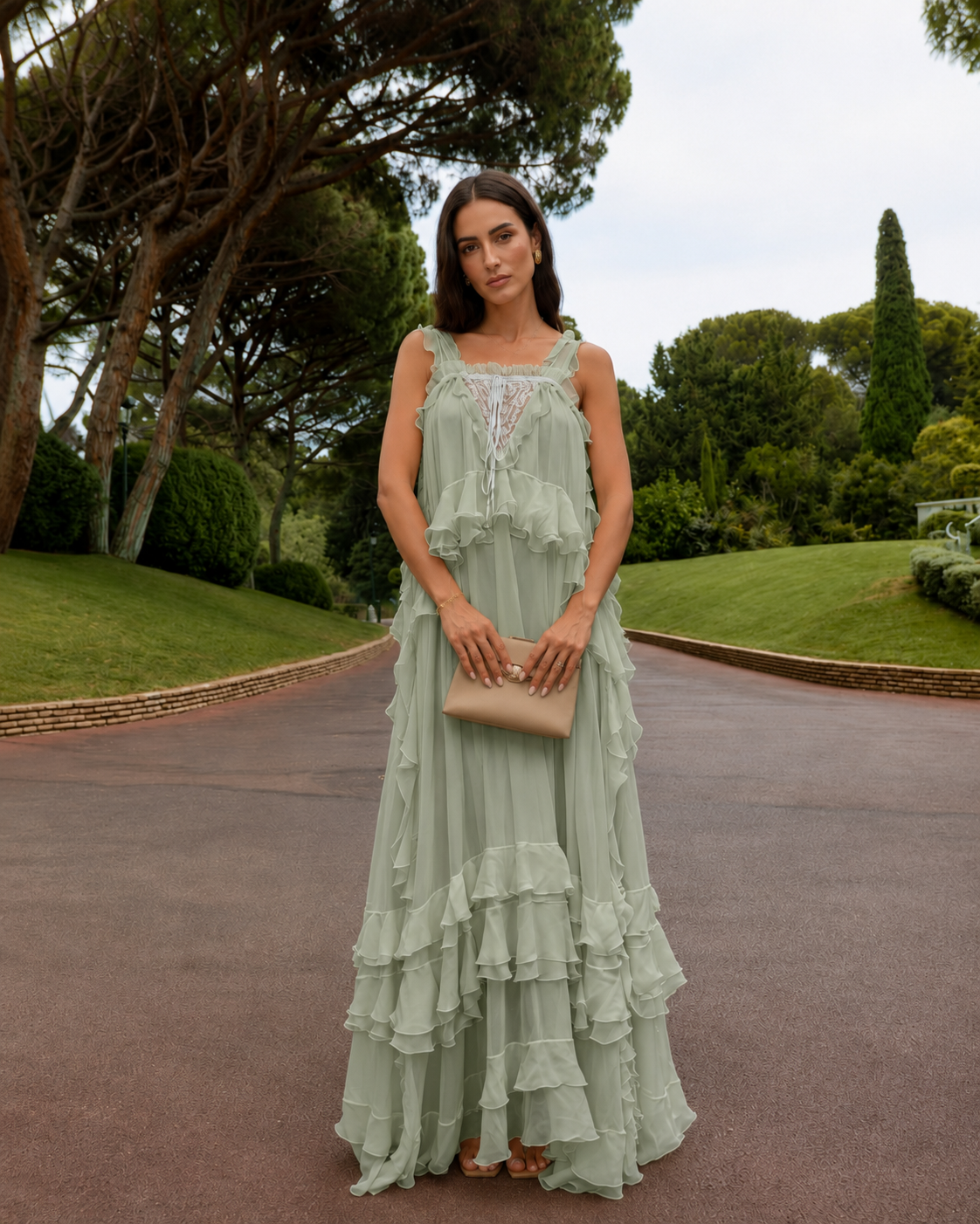 Front view of sage green ruffle trim lace panel maxi dress with tiered hem