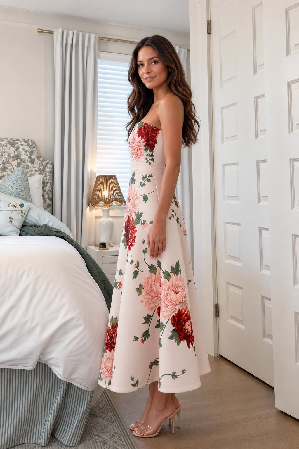 Side view of woman in pink floral midi dress