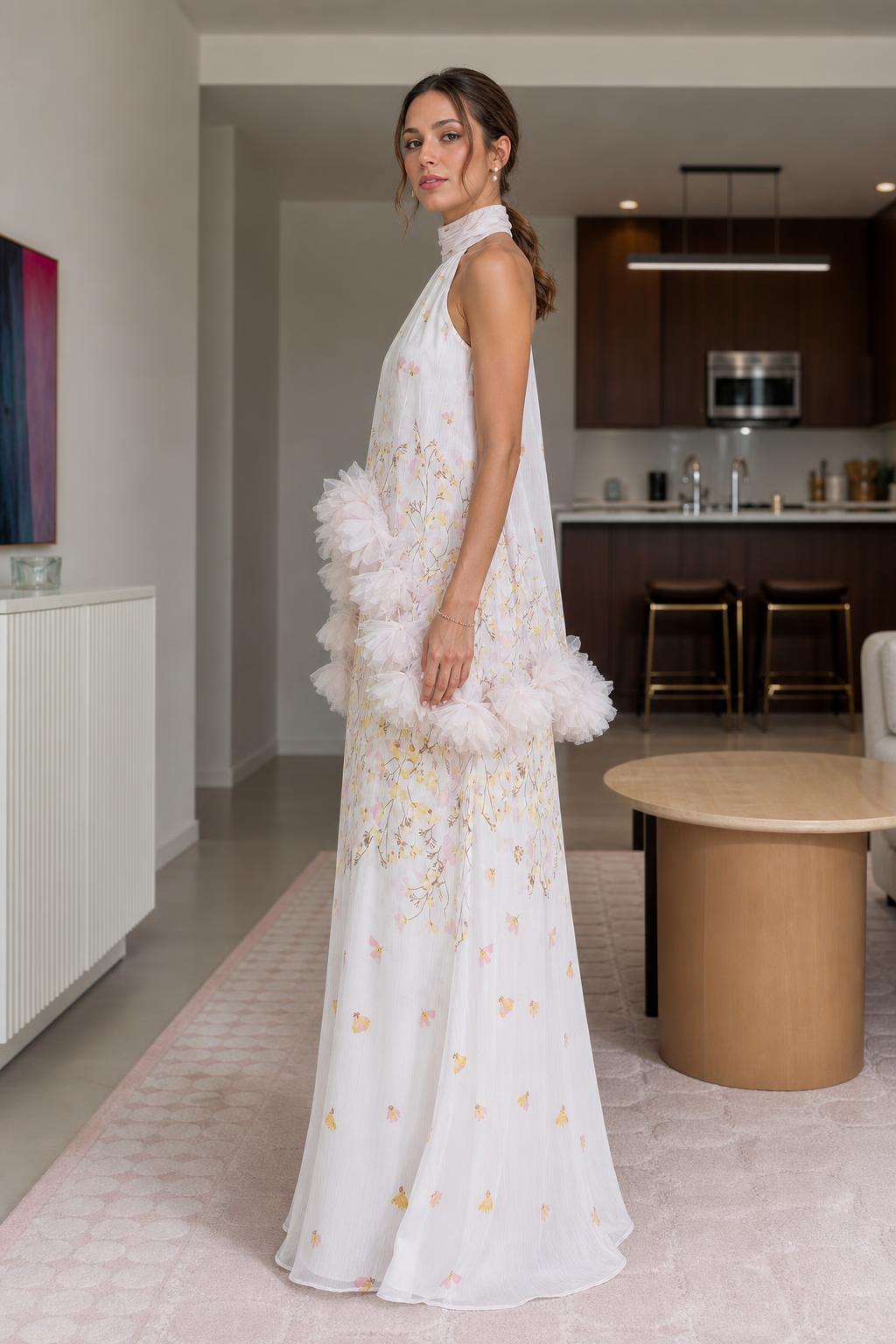 Side view of white floral halter maxi dress