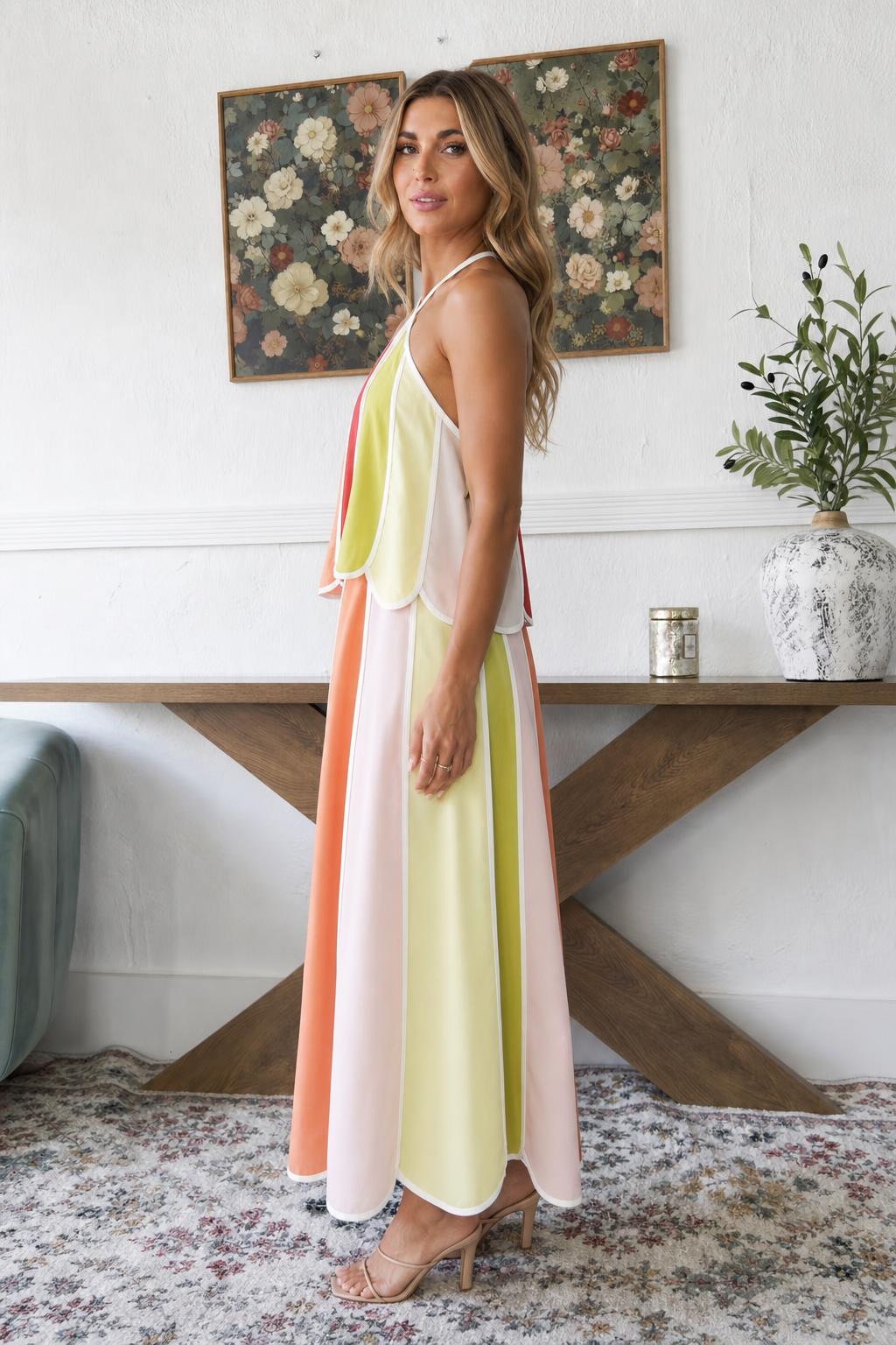 Model wearing multicolor maxi dress side profile