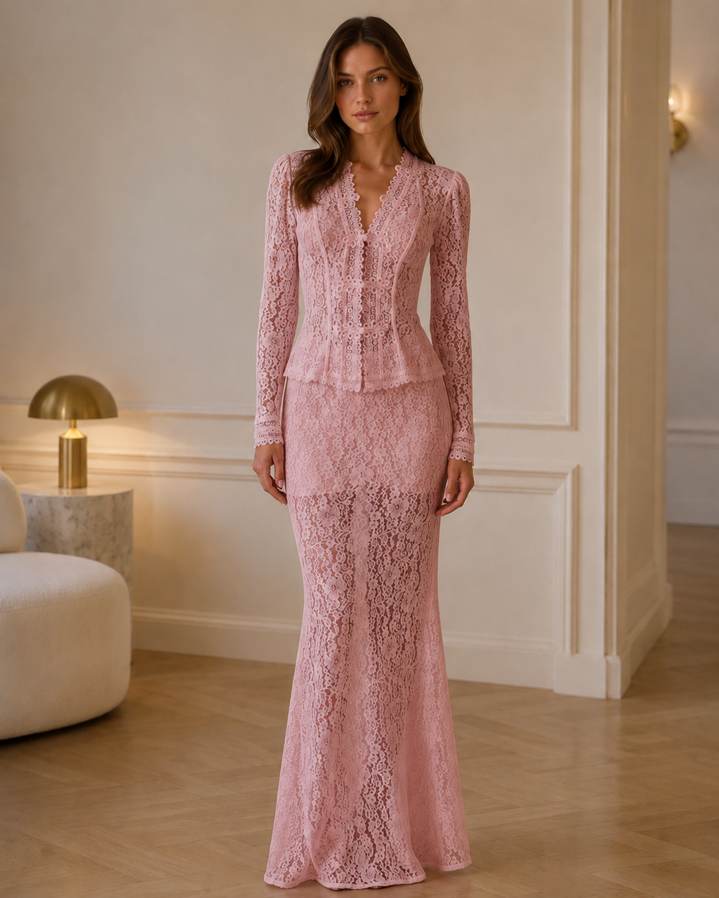 Front view of blush pink lace long sleeve mermaid maxi dress with deep V neckline