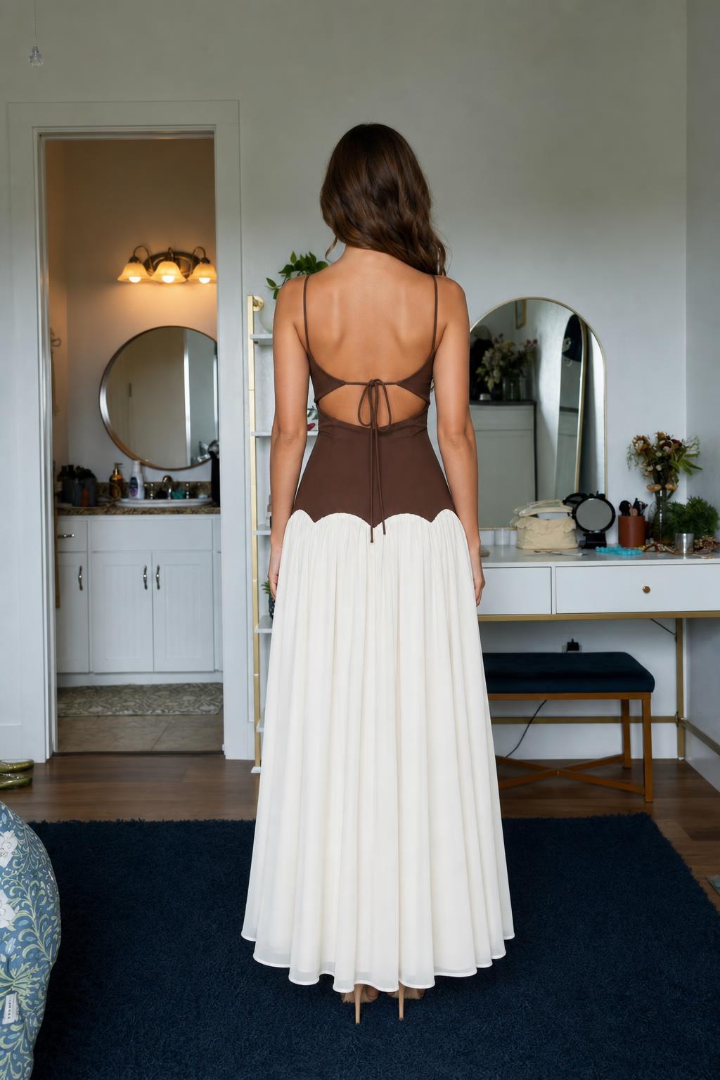 Back view showing cutout straps of brown and white maxi dress