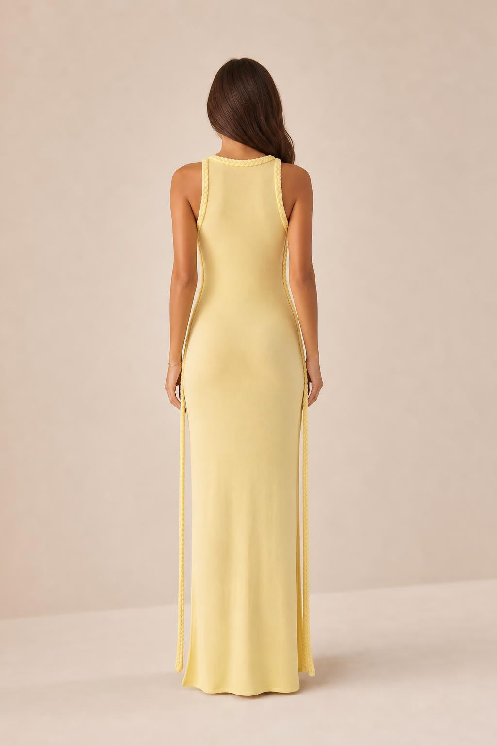 Back view of model wearing yellow maxi dress