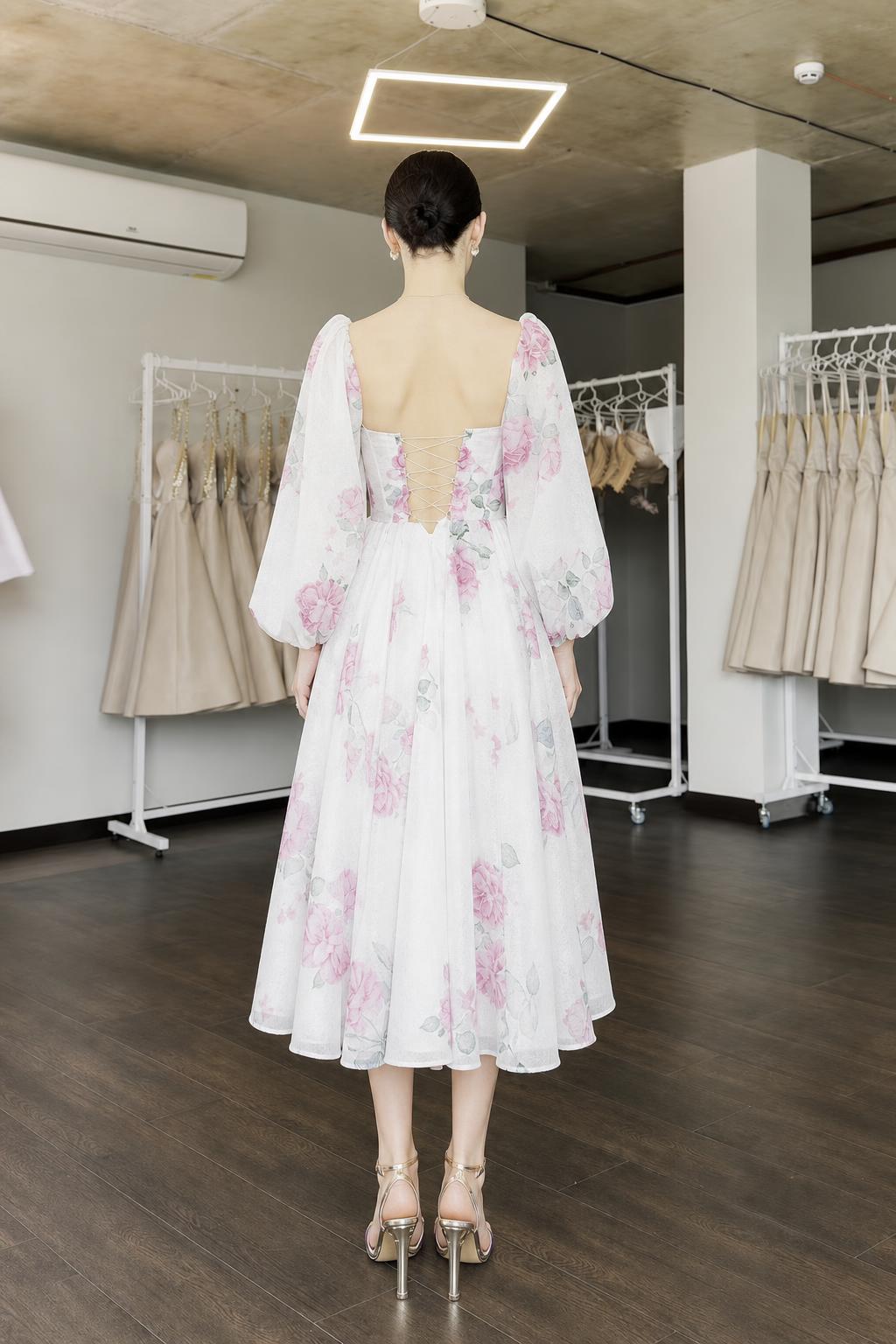 Back view of white floral midi dress