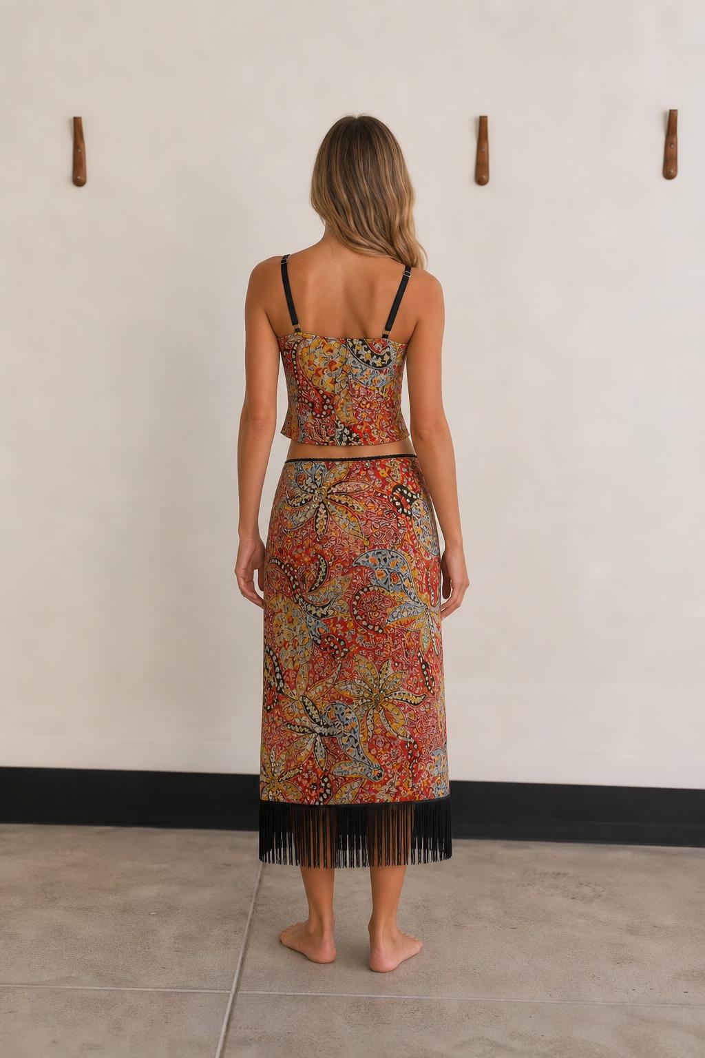 Back view of woman wearing Red Multi paisley two piece set