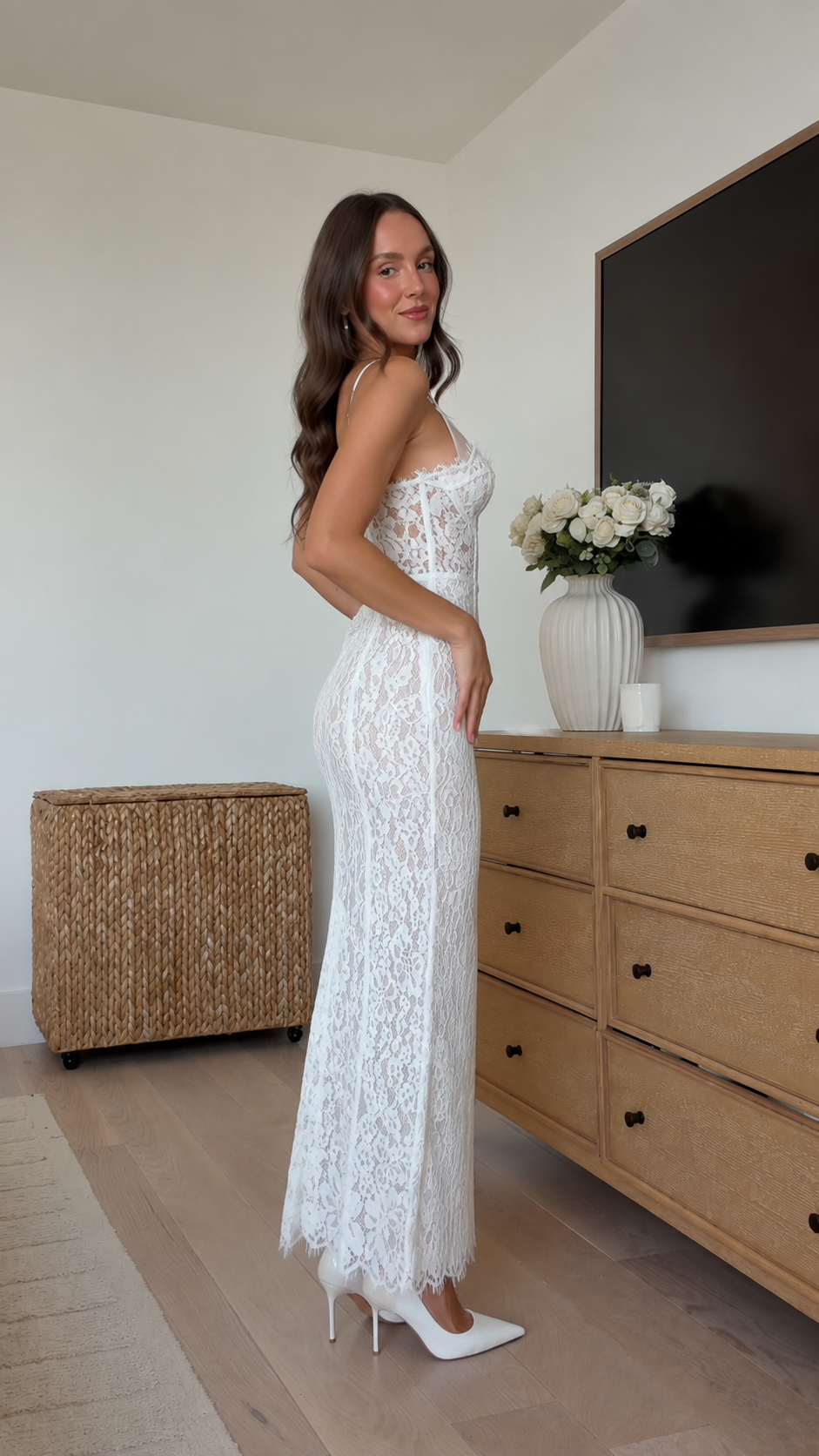 Side view of white floral lace maxi dress with slim straps