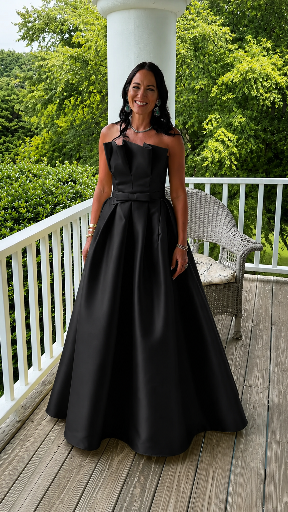 Front view of black strapless foldover bodice evening gown