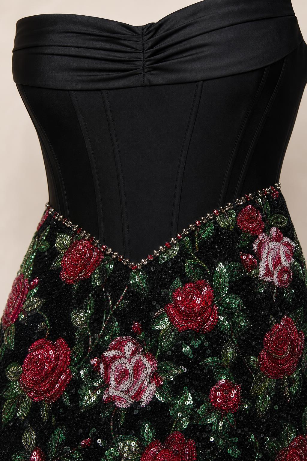 Close up of black bodice and sequin rose skirt detail