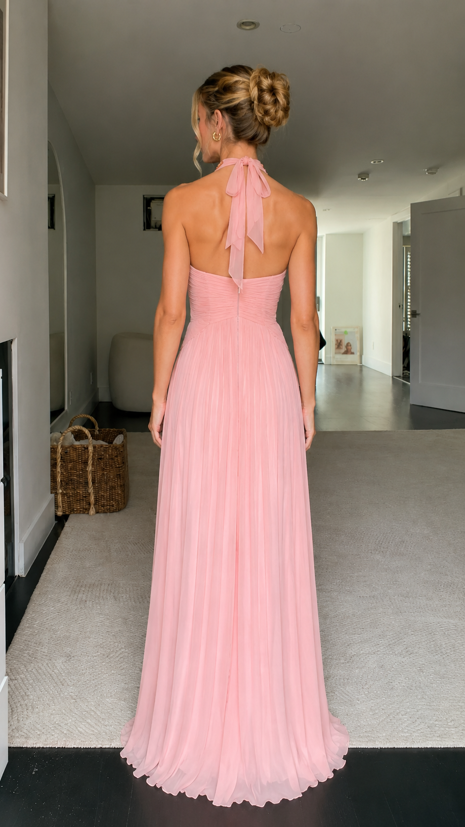 Back view of blush pink halter pleated maxi dress with tie neck