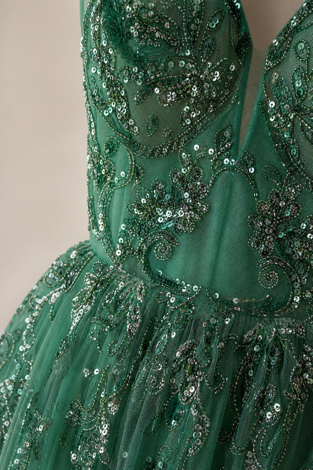 Close up of bodice embroidery on green gown