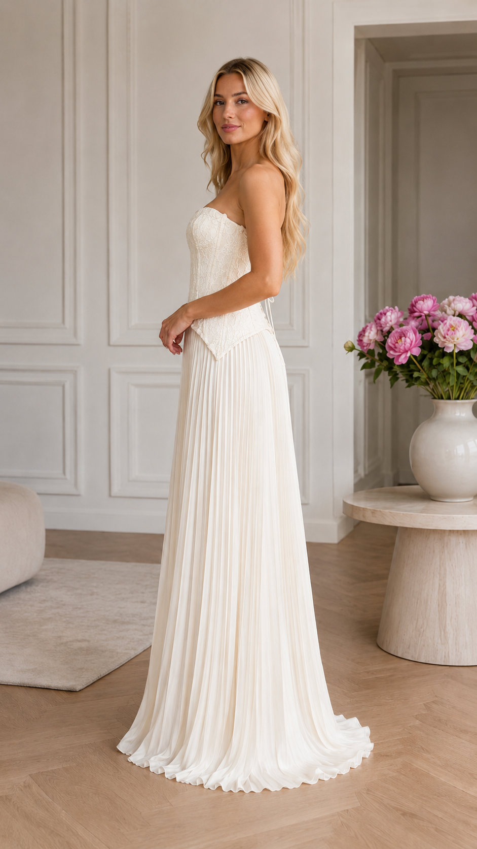 Side profile of white strapless gown