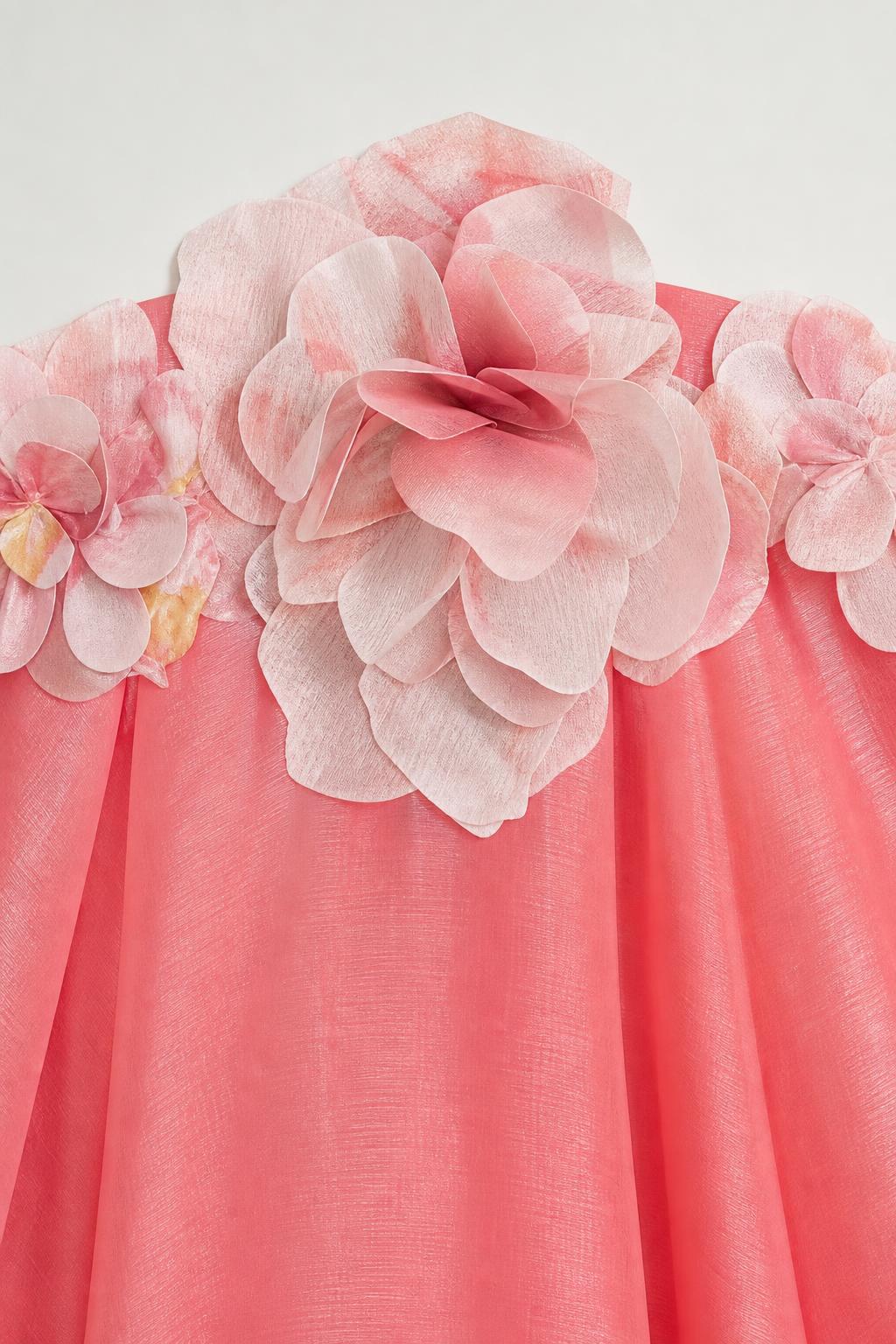 Close-up detail of 3D fabric flower appliques on dress neckline