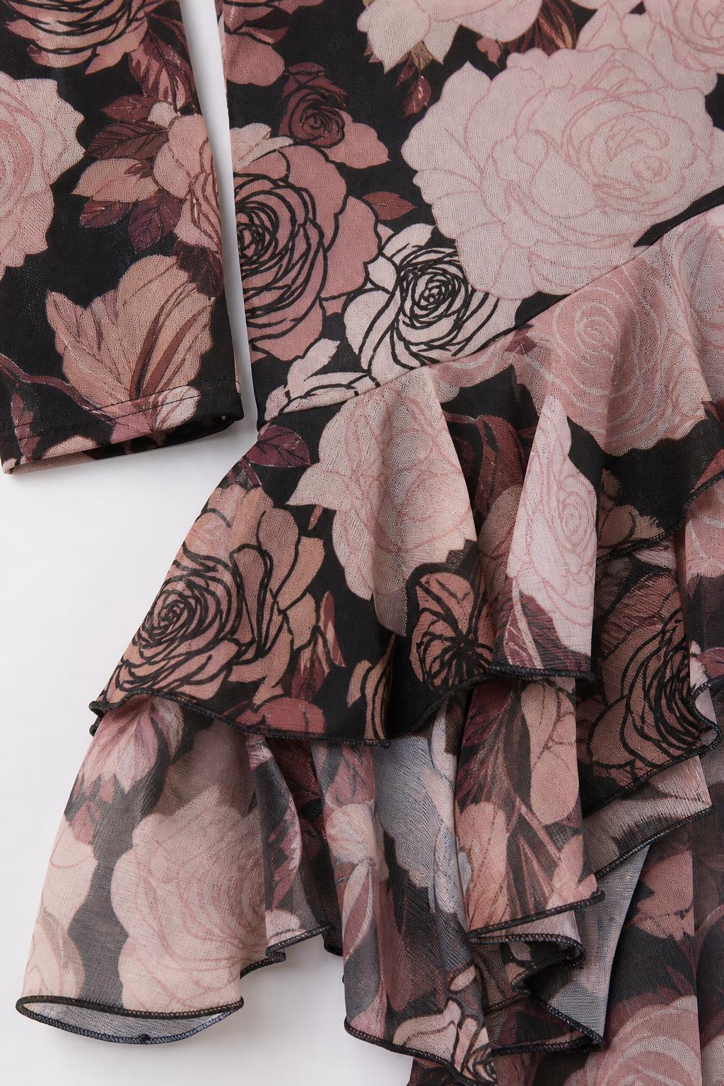 Close-up of sleeve and ruffled hem detail