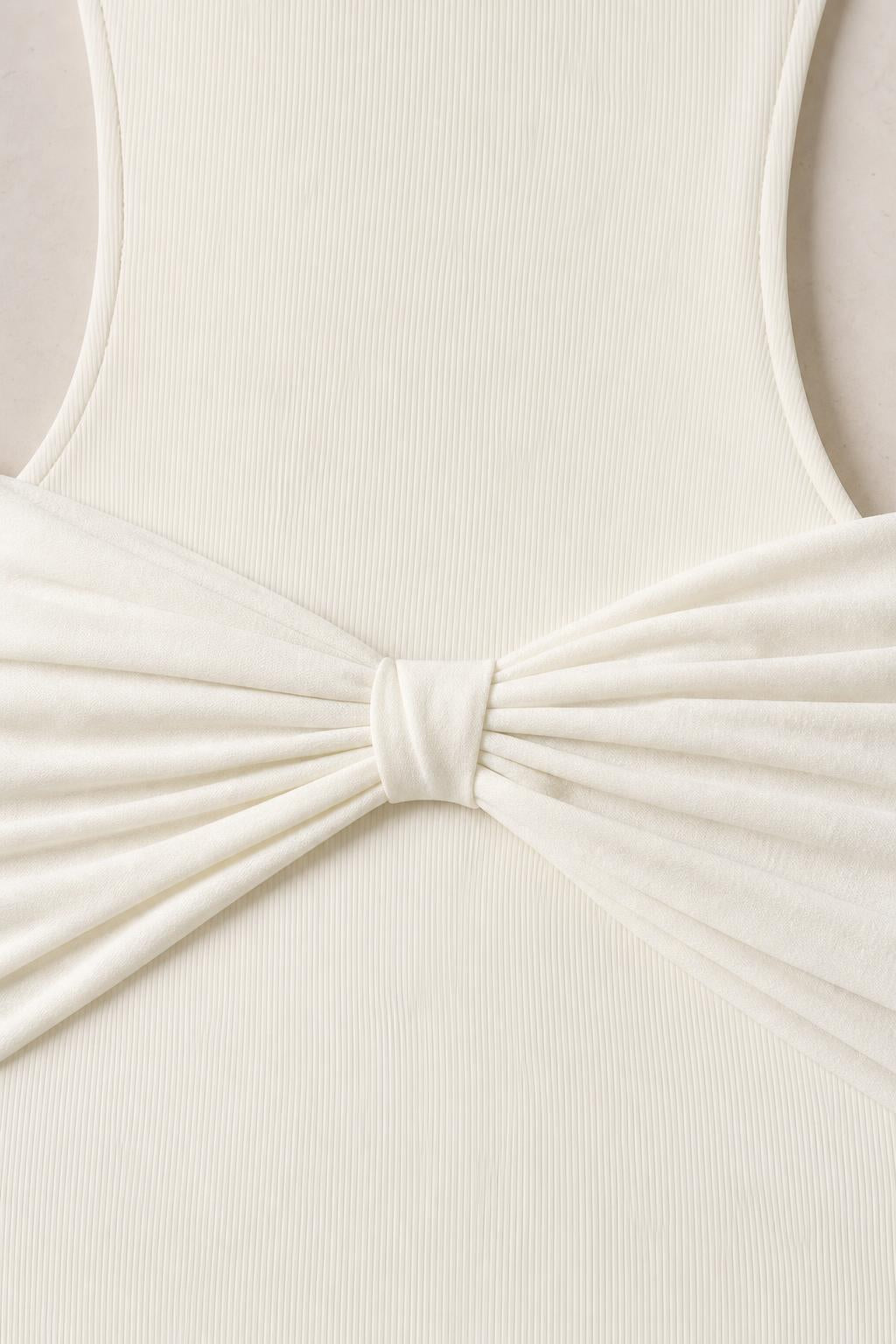 Close-up detail of front ruched knot and fabric texture