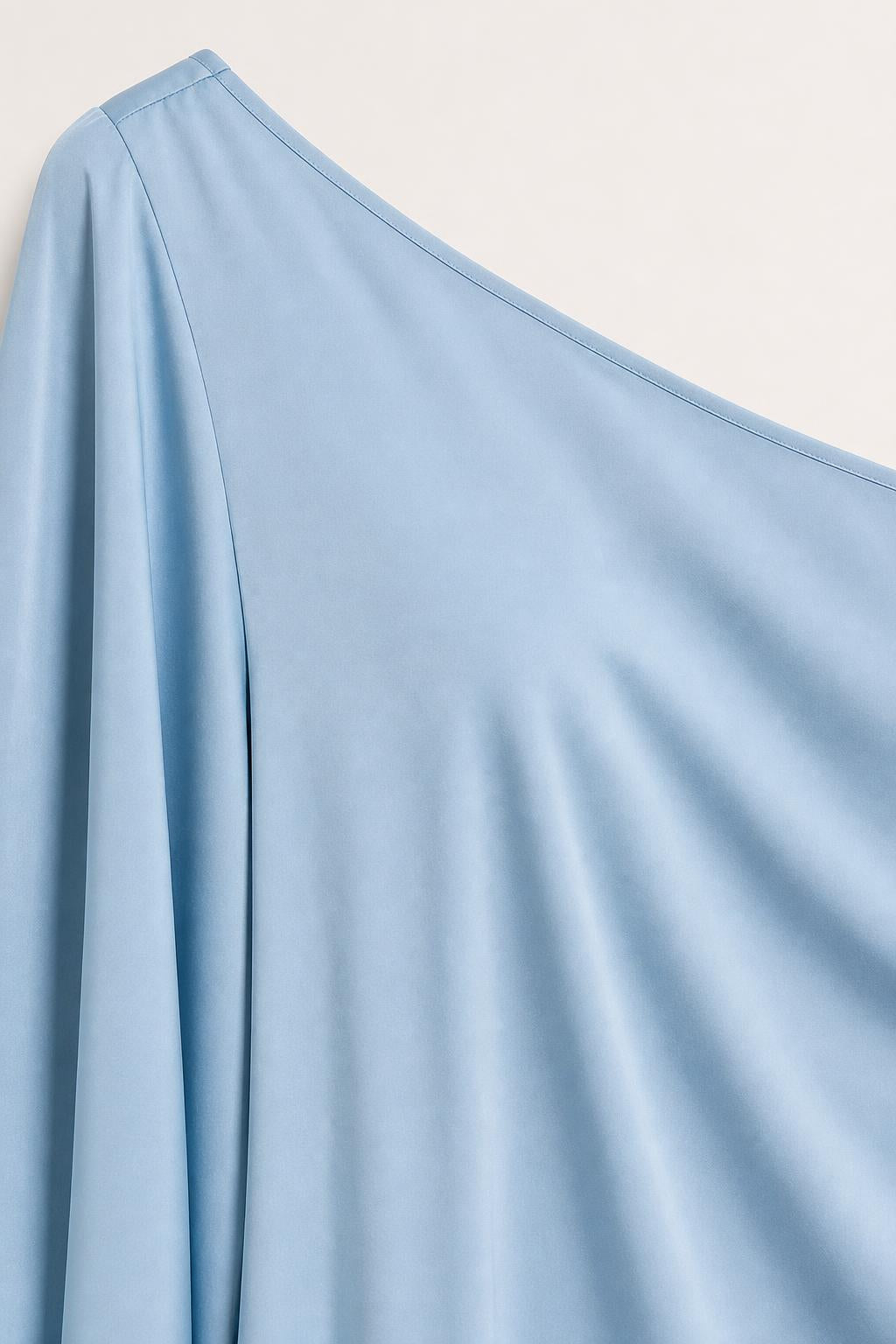 Close-up of light blue smooth fabric texture