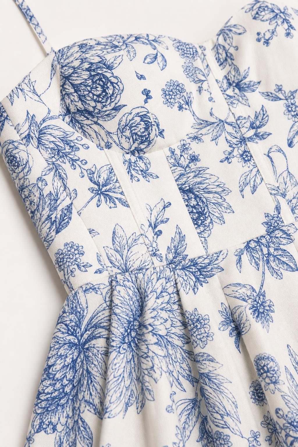 Close-up of structured sweetheart bodice and floral pattern