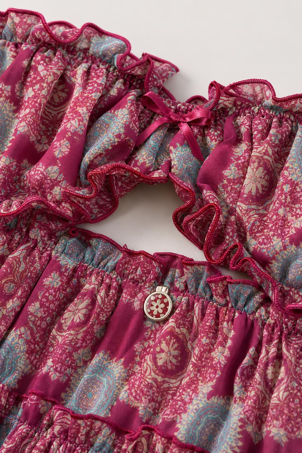 Close up of ruffles and hardware detail on top