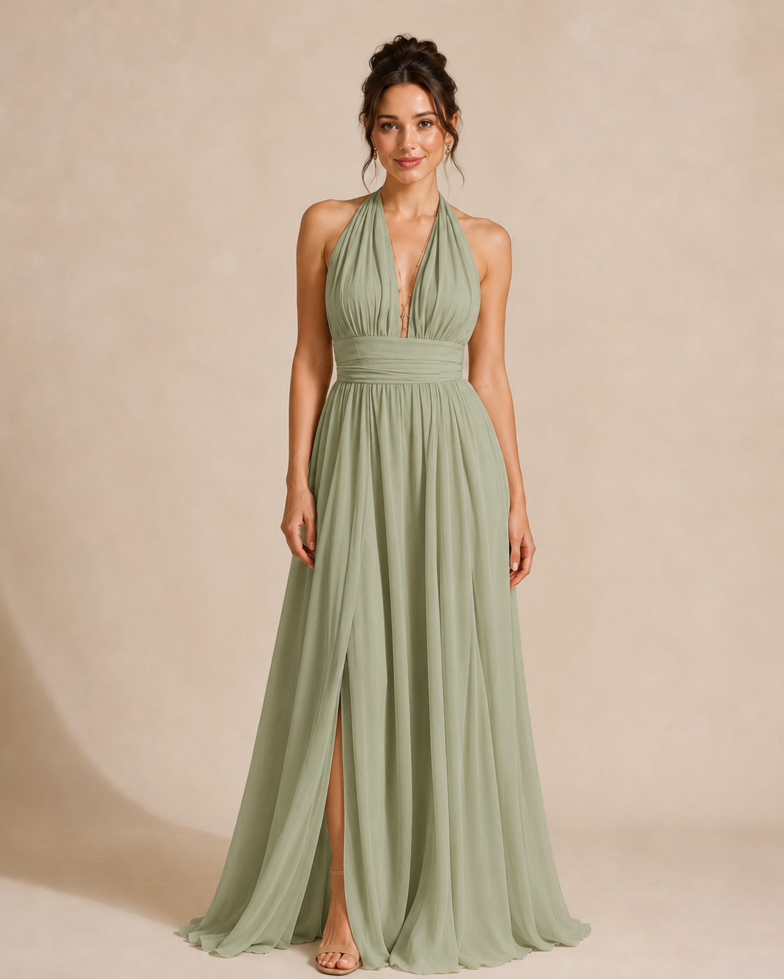 Full-length front view of sage green halter maxi dress with wrap waist and flowing skirt