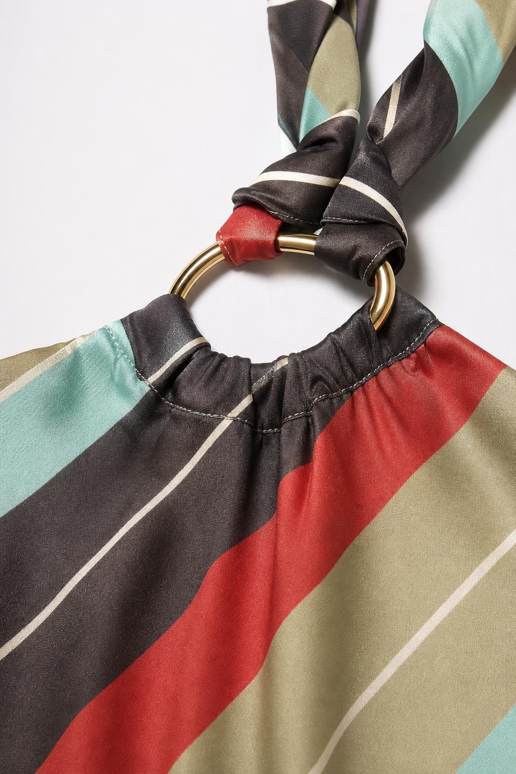 Close-up detail of metal ring and fabric texture