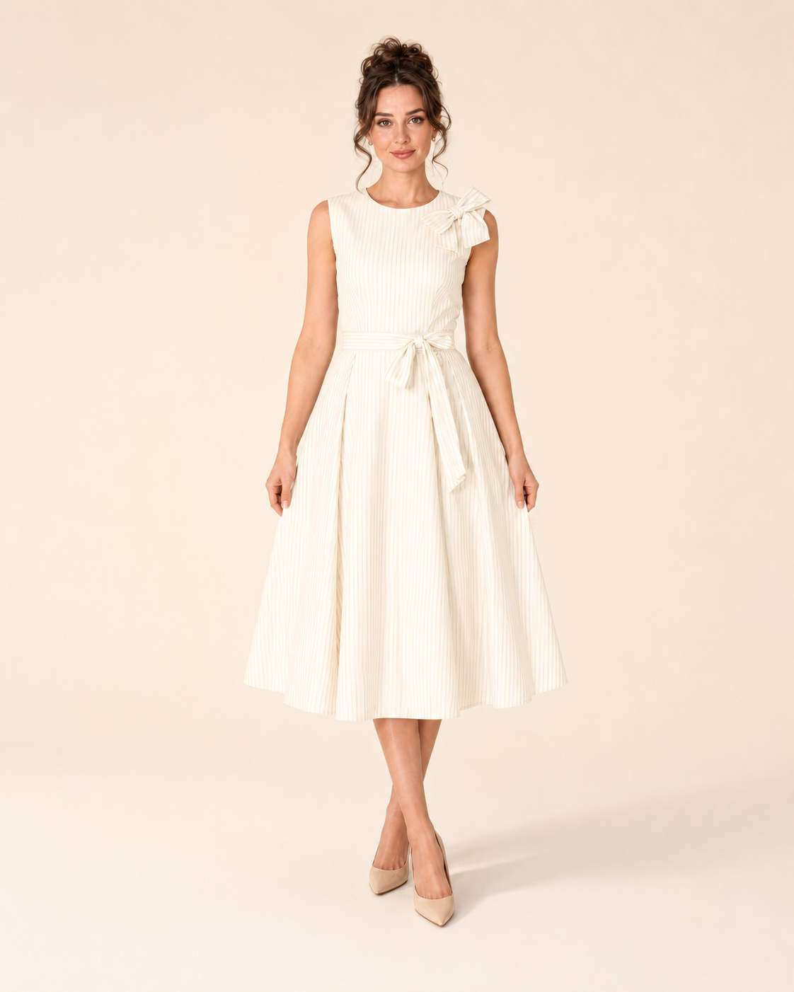 Front view of ivory sleeveless striped midi dress with shoulder bow and fit-and-flare silhouette