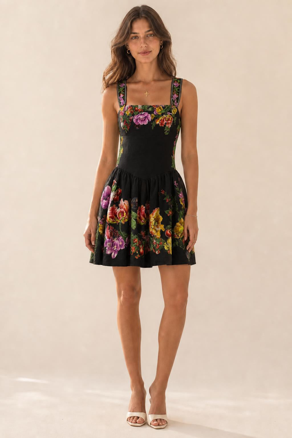 Front view of black botanical print mini dress variant
