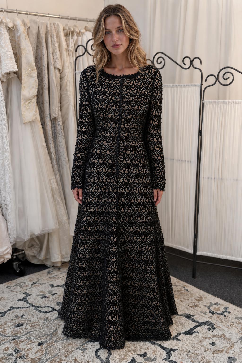 Woman wearing black long-sleeve crochet lace maxi dress