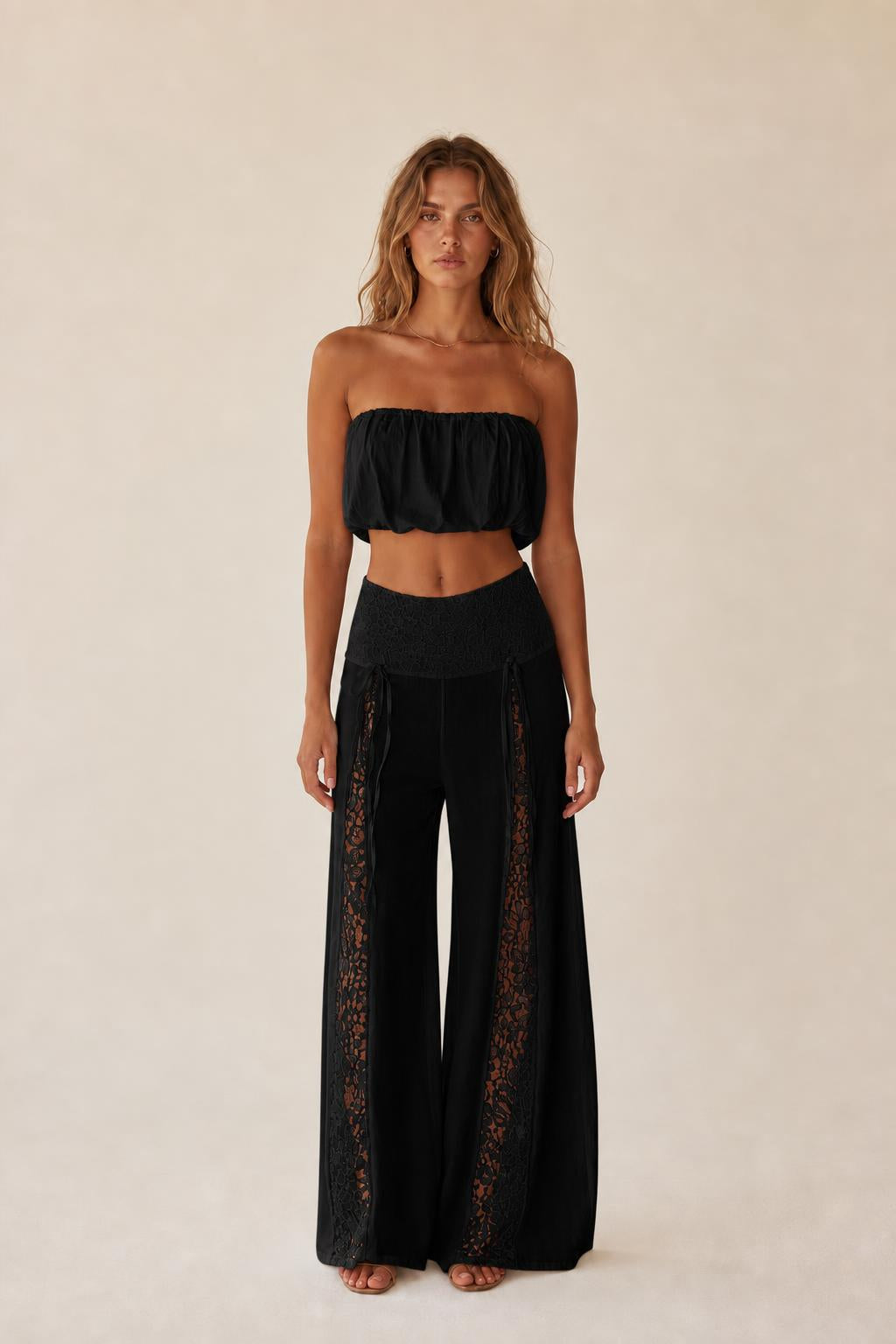 Front view of the black color variant two-piece set