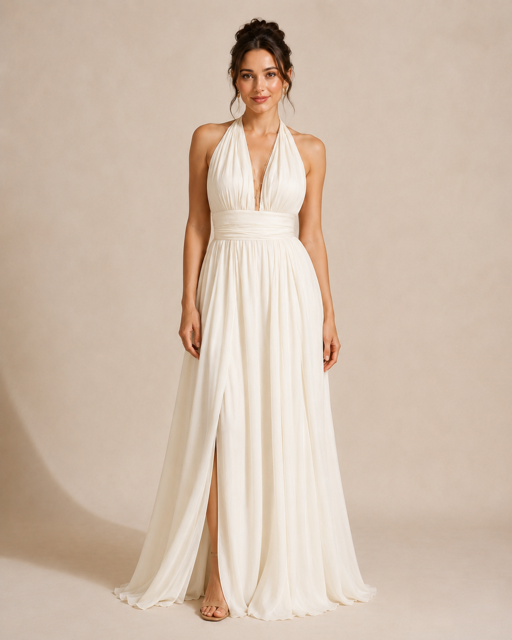 Full-length front view of ivory halter maxi dress with plunge neckline and slit