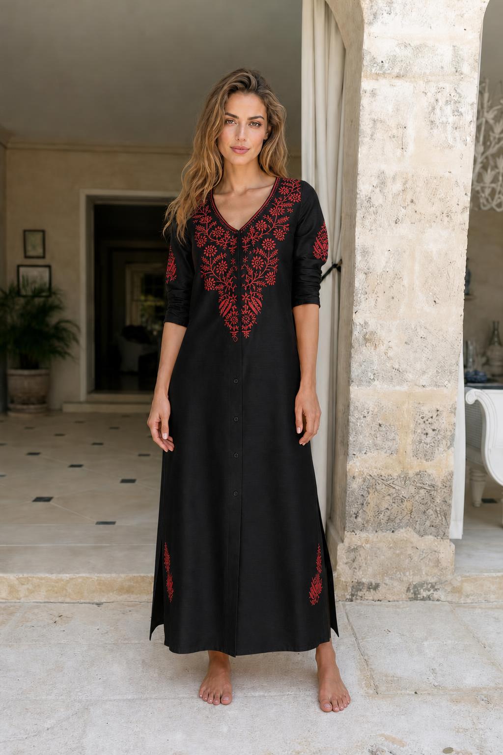 Model wearing black embroidered maxi dress