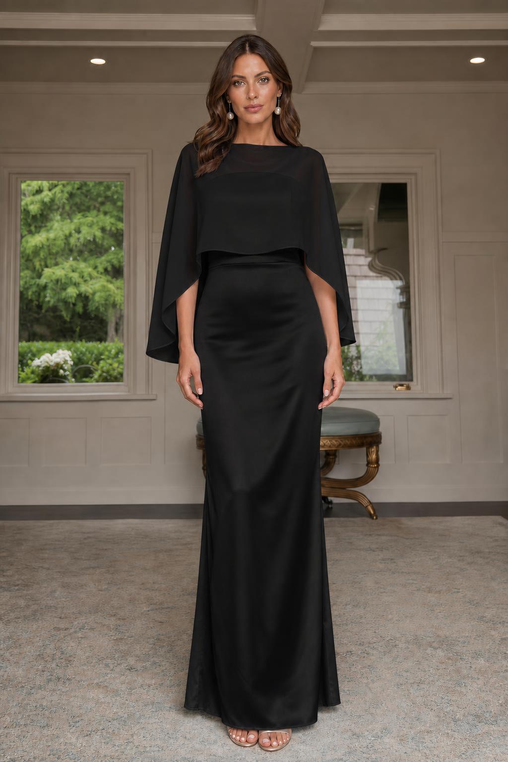 Model wearing black cape-overlay evening gown