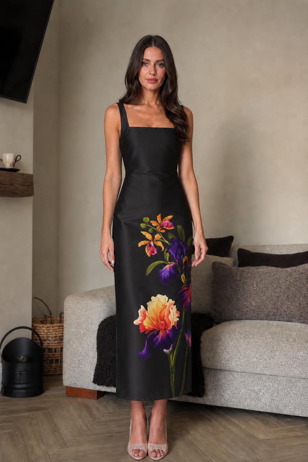 Front view of black floral midi dress on model