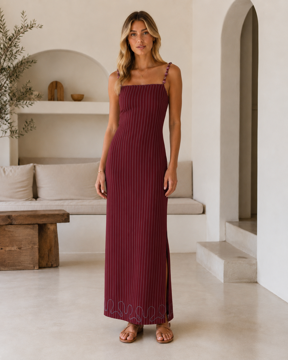 Front view of burgundy striped slim fit maxi dress