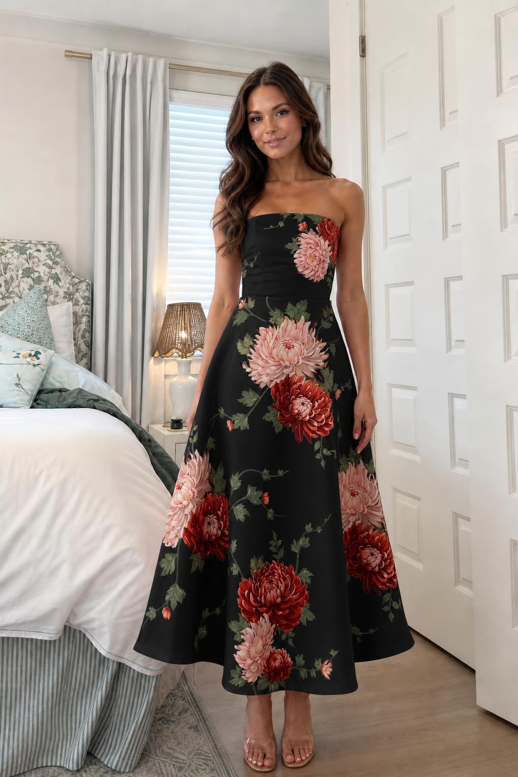 Woman wearing black floral strapless midi dress