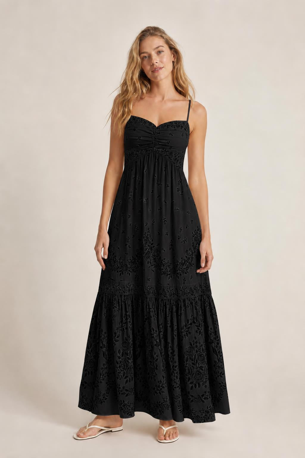 Front view of black floral maxi dress on model