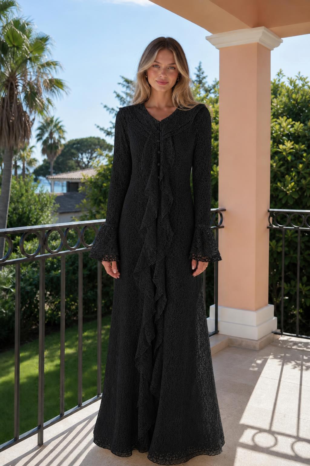 Front view of woman wearing black long sleeve lace ruffle maxi dress