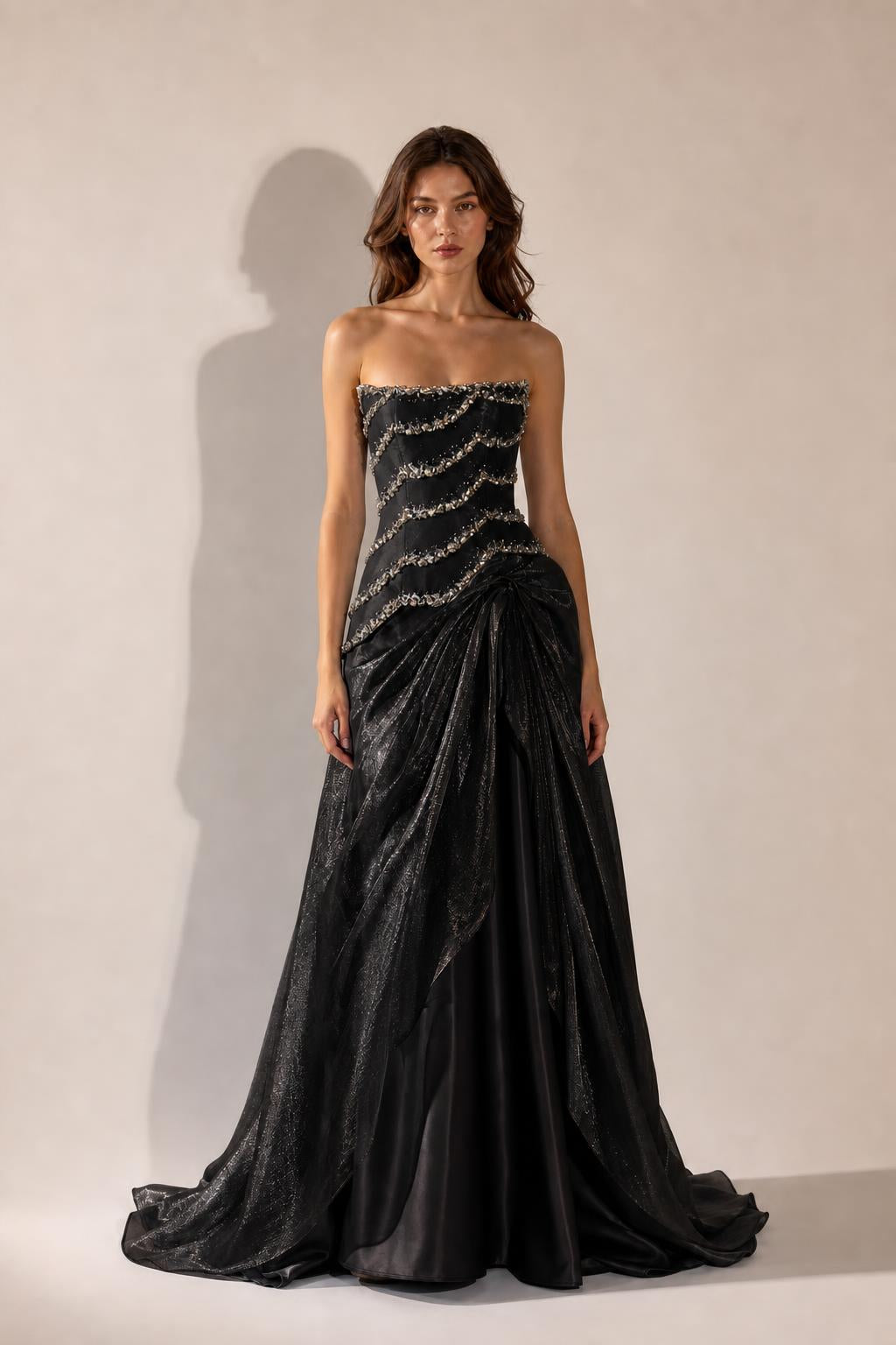 Front view of Black strapless beaded evening gown