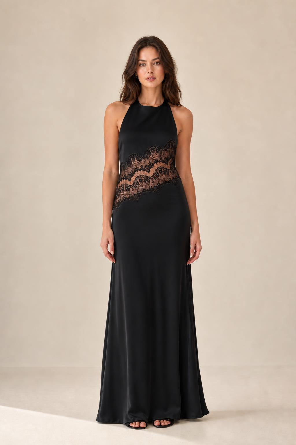 Front view of black halter neck maxi dress with lace insert