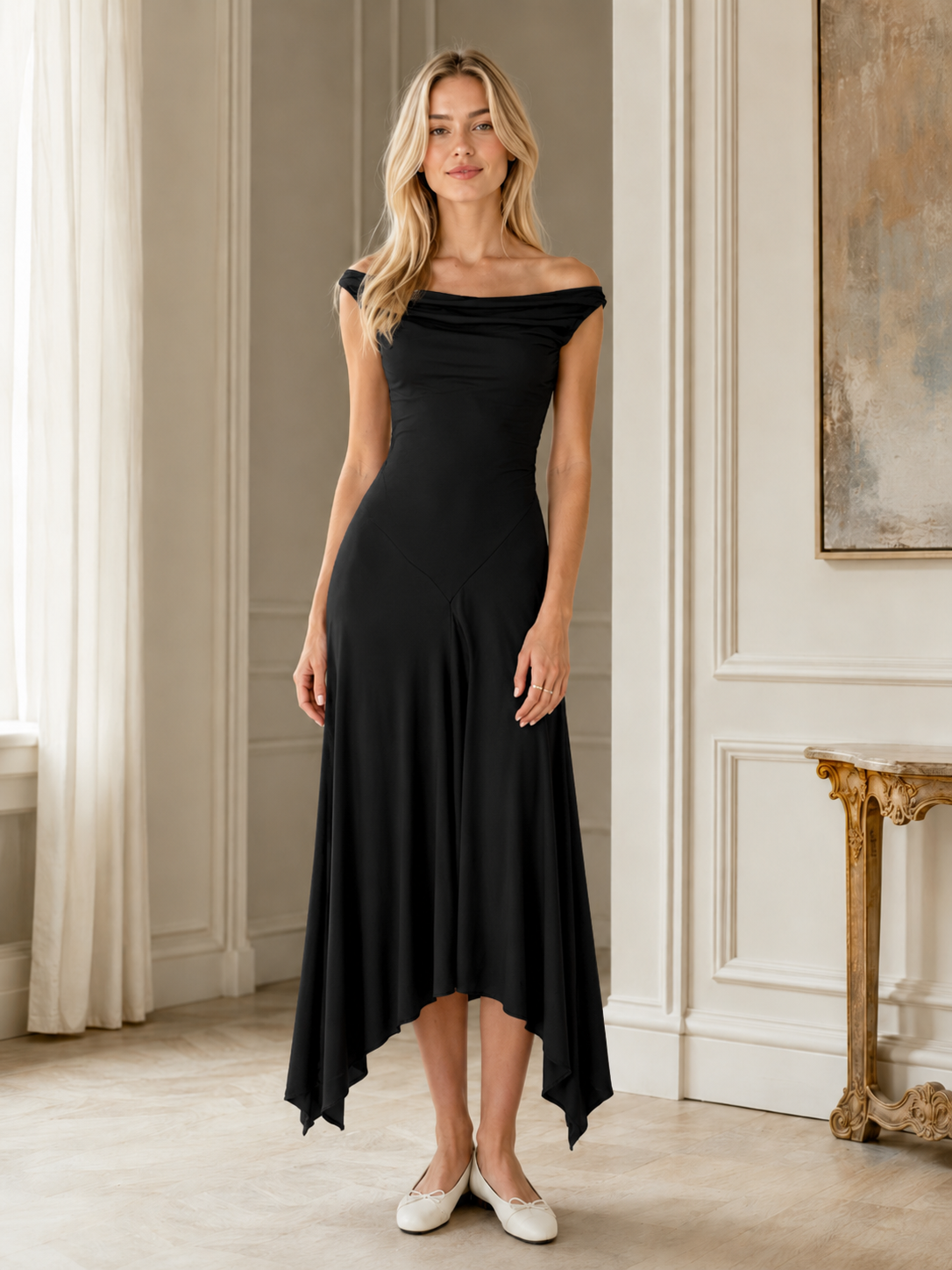 Front view of black off-shoulder handkerchief hem dress
