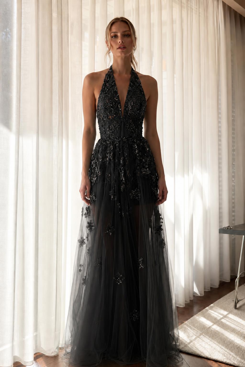 Front view of black embroidered halter evening dress