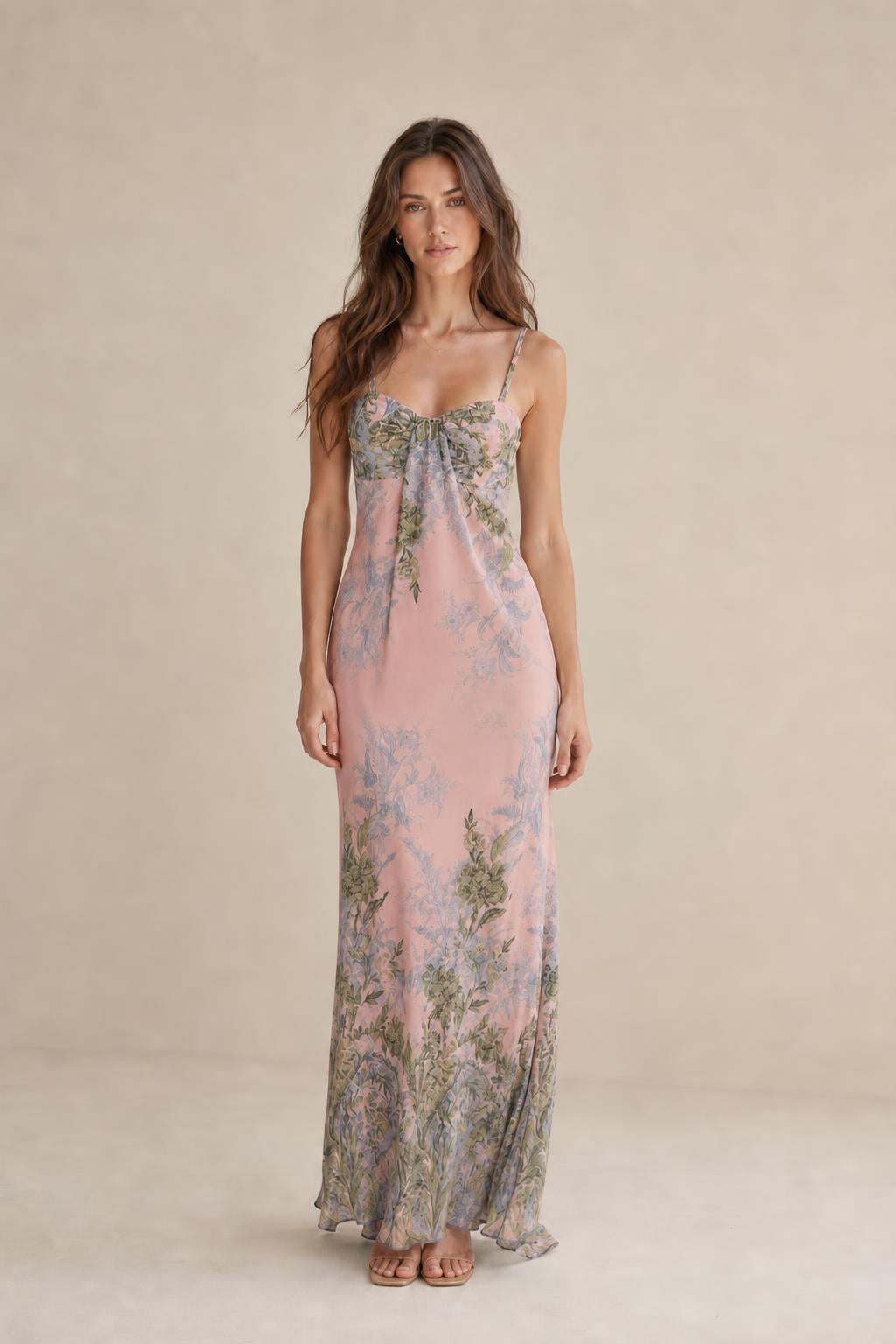 Model wearing pink floral maxi dress