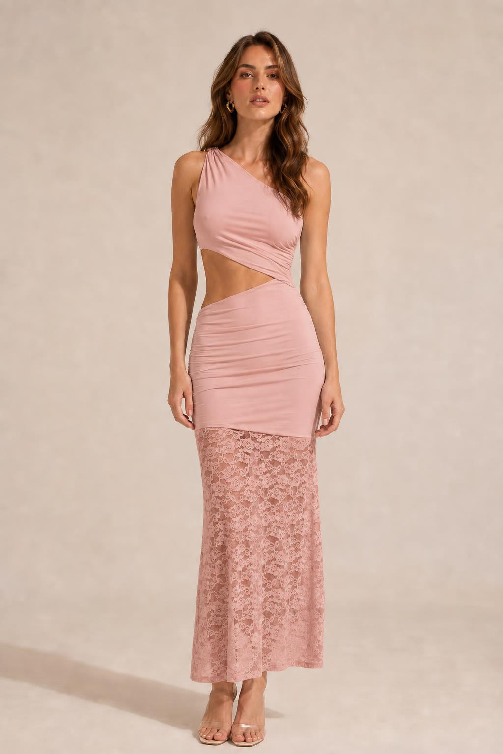 Front view of model wearing blush one-shoulder cutout lace maxi dress
