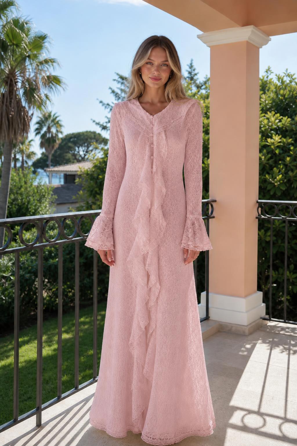Front view of woman wearing pink long sleeve lace ruffle maxi dress