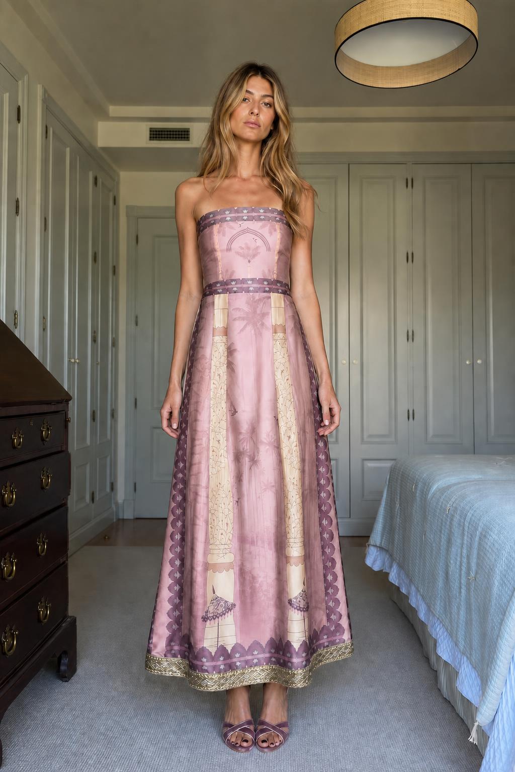 Model wearing Pink strapless maxi dress