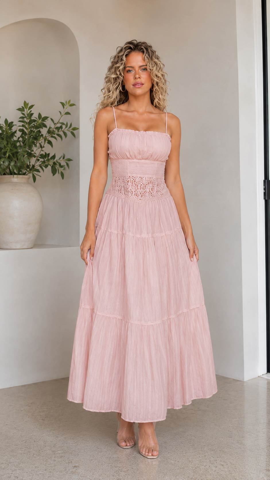 Front view of blush pink spaghetti strap tiered maxi dress
